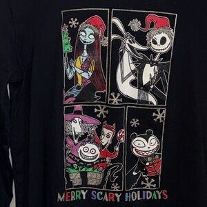 NWOT never been worn. Disney Black Long Sleeve Shirt with Festive Cartoon Design